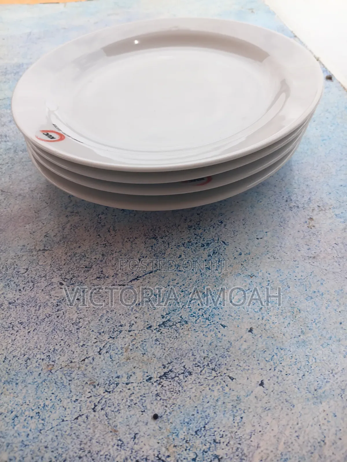 A White Ceramic or Porcelain Plate.