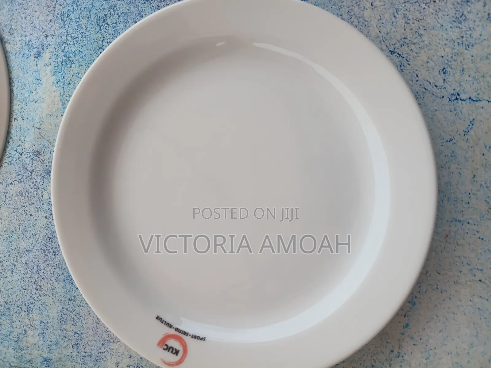 A White Ceramic or Porcelain Plate.