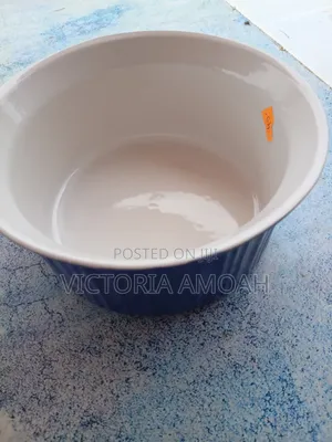 A Glossy Blue Ceramic Ramekin.