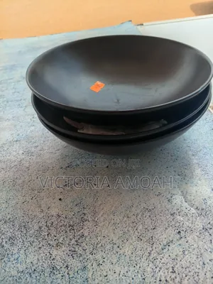 A Black Ceramic Shallow Bowl.