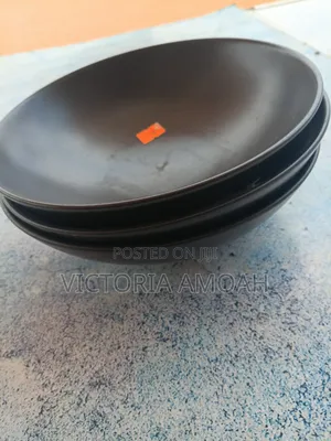 A Black Ceramic Shallow Bowl.