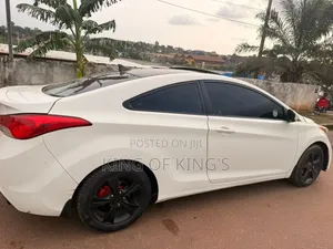 Hyundai Elantra GS Coupe FWD (1.8L 4cyl 6A) 2013 White