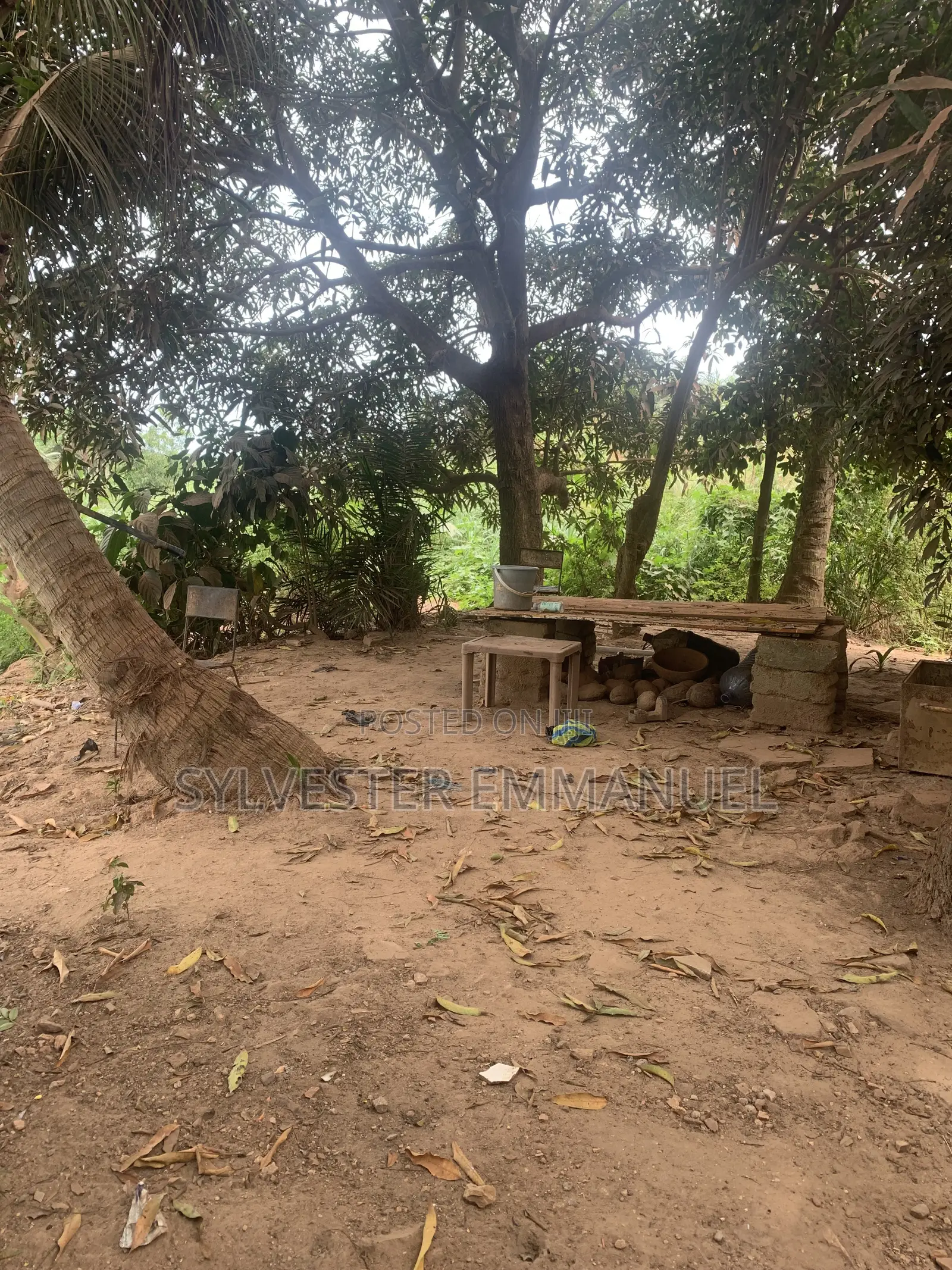 A Plot of Land (70/100 ) at Aplaku on a Roadside With a Building