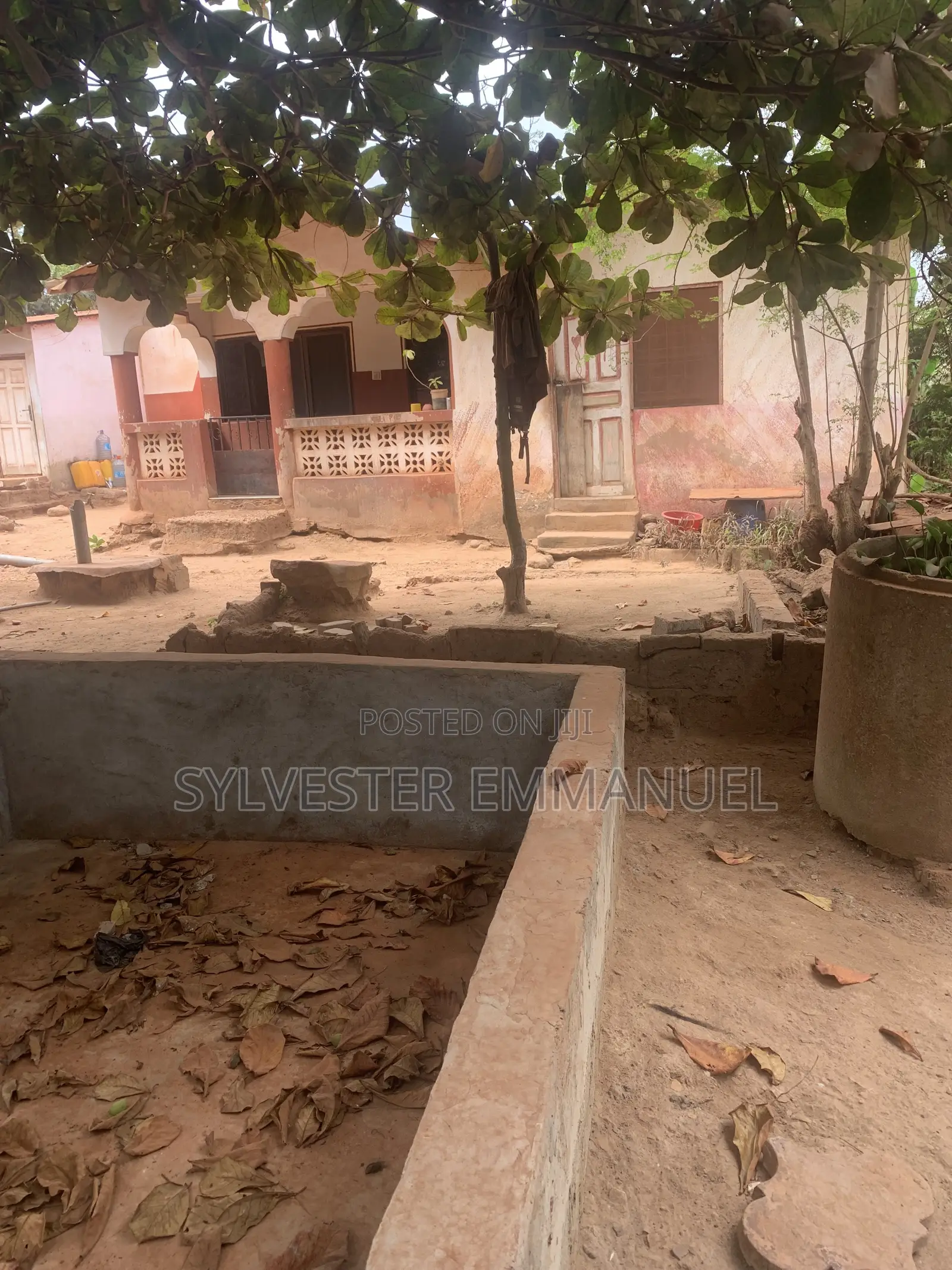A Plot of Land (70/100 ) at Aplaku on a Roadside With a Building
