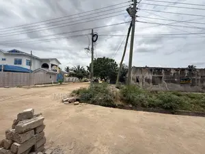 A Plot of Titled Land for Sale at Spintex With an Old Structure