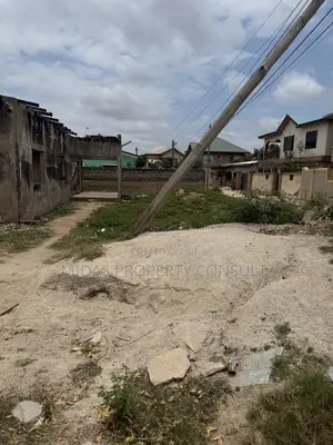 A Plot of Titled Land for Sale at Spintex With an Old Structure