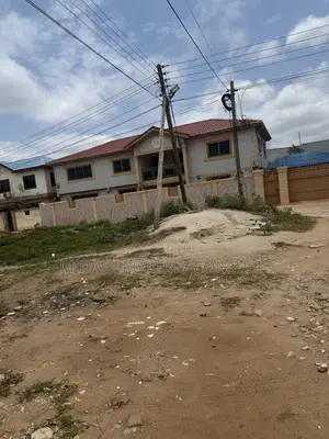 A Plot of Titled Land for Sale at Spintex With an Old Structure