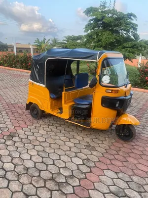 Bajaj RE 2022 Yellow