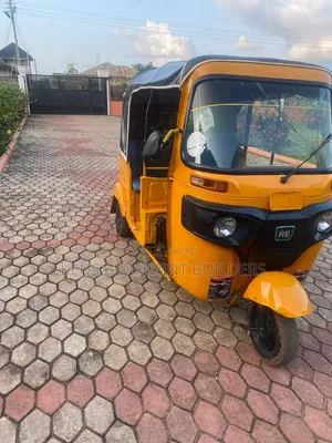 Bajaj RE 2022 Yellow