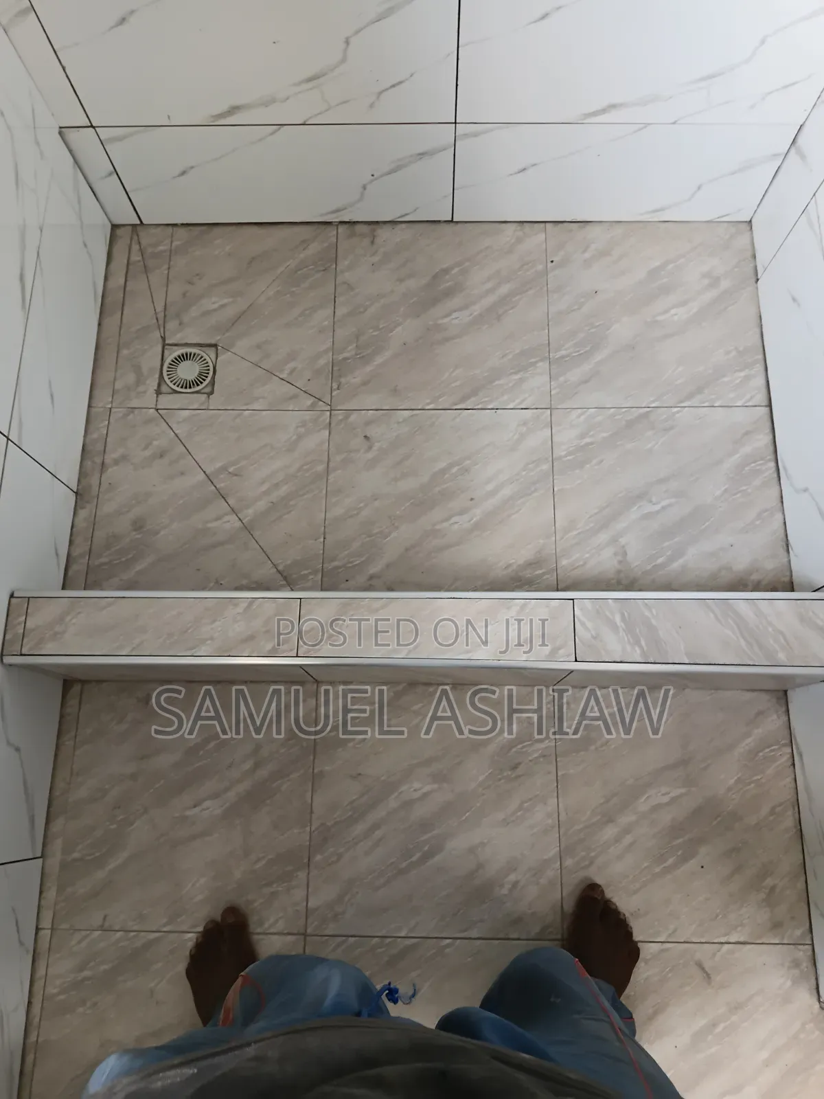 Quality Tiling, Clean Finishing
 Skilled Tiler at Work