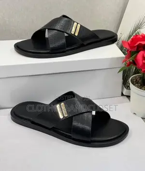 Black Crocodile-Embossed Criss-Cros Slide Sandals Featuring a Polished