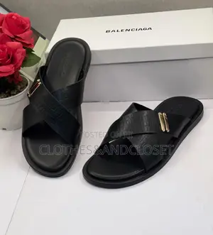 Black Crocodile-Embossed Criss-Cros Slide Sandals Featuring a Polished
