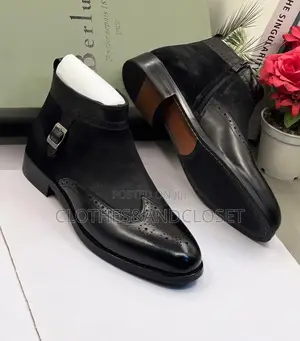 Black Men's Dress Boots Featuring a Combination of Polished Smooth