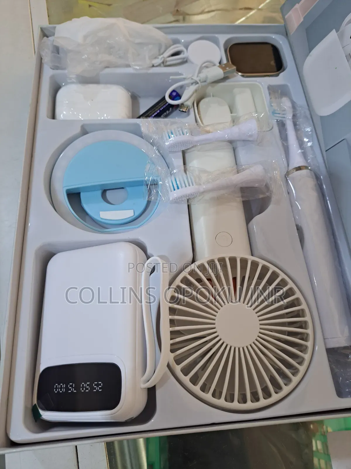 12-in-1 Smart Watch With "Airpod, Fan, Power Bank, Brush, Ring Light