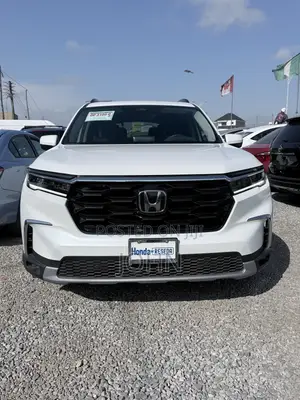 Honda Pilot Touring+ AWD 2025 White