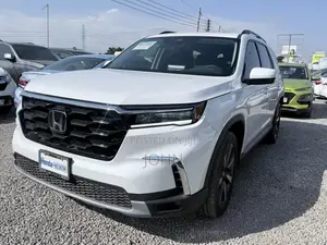 Honda Pilot Touring+ AWD 2025 White