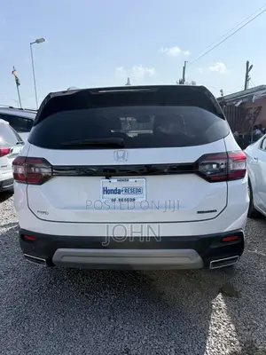 Honda Pilot Touring+ AWD 2025 White