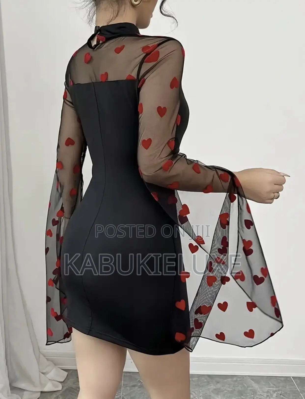 Elegant Black Bodycon Mini Dress With Heart Mesh Sleeves