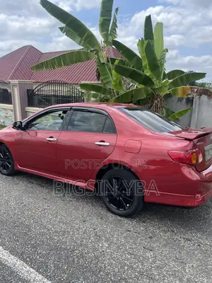 Toyota Corolla Base 4dr Sedan (1.8L 4cyl 5M) 2010 Red