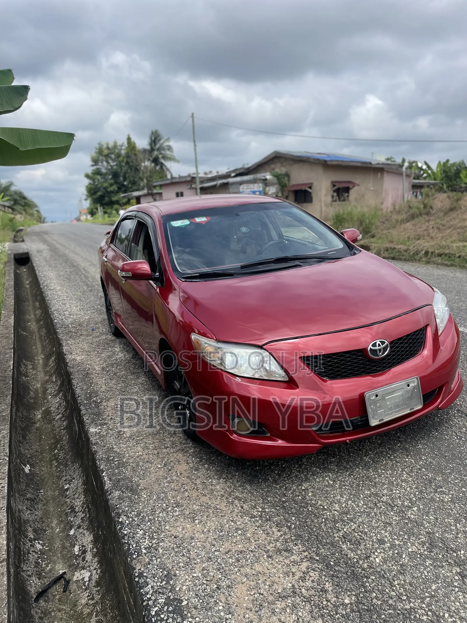 Toyota Corolla Base 4dr Sedan (1.8L 4cyl 5M) 2010 Red