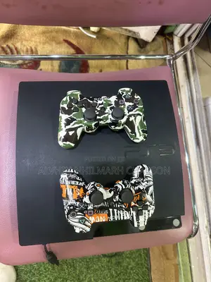 Ps3 Slim Loaded With Games and Two Pads