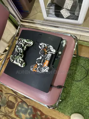 Ps3 Slim Loaded With Games and Two Pads