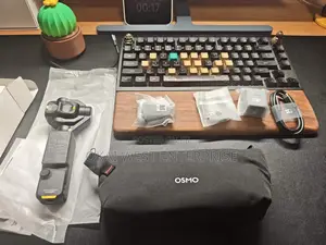 DJI Osmo Mobile 4 (Osmo 4) – Portable Smartphone Gimbal Stabilizer