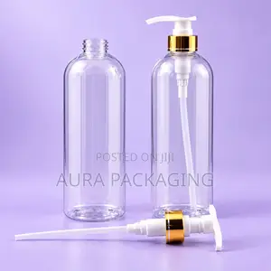 Clear Lotion and Shampoo Bottles With Gold Pump
