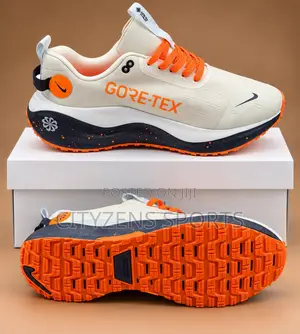 Nike Off White and Orange Trainers