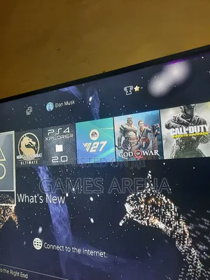 Ps4 Standard With FC 27 and 7 Other Games + 2 Controllers