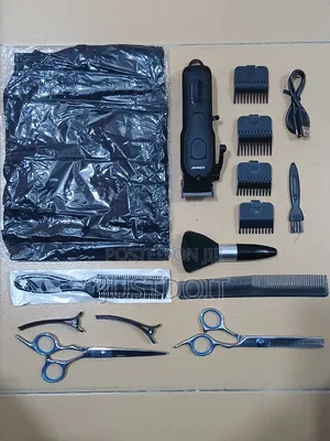 Rechargeable Clipper With Barbering Accessories
