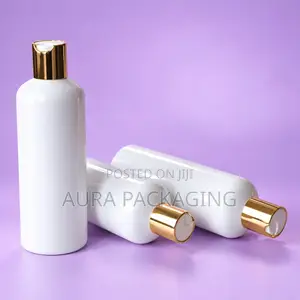 White Shower Gel or Lotion Bottle With Gold Press Cap
