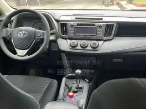 Toyota RAV4 LE 4dr SUV AWD (2.5L 4cyl 6A) 2015 Orange