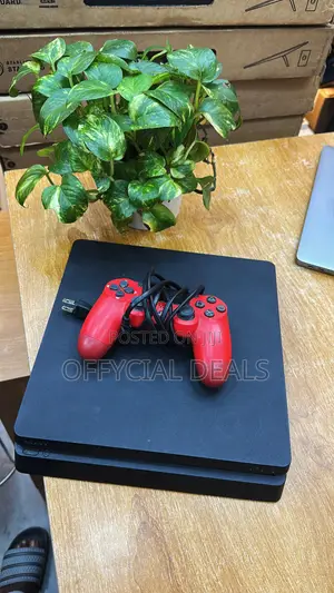 PS4 Slim With a Controller and 5 Games