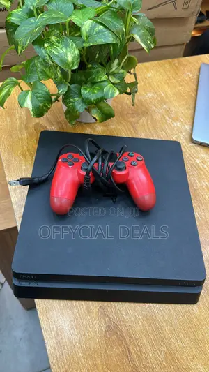 PS4 Slim With a Controller and 5 Games