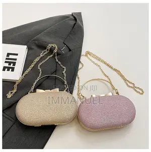 Ladies Cute Oval Clutch Bags