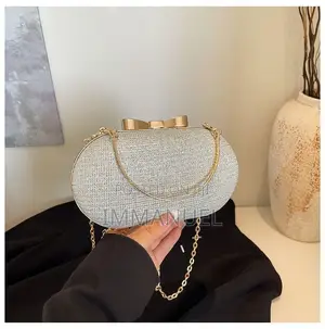 Ladies Cute Oval Clutch Bags