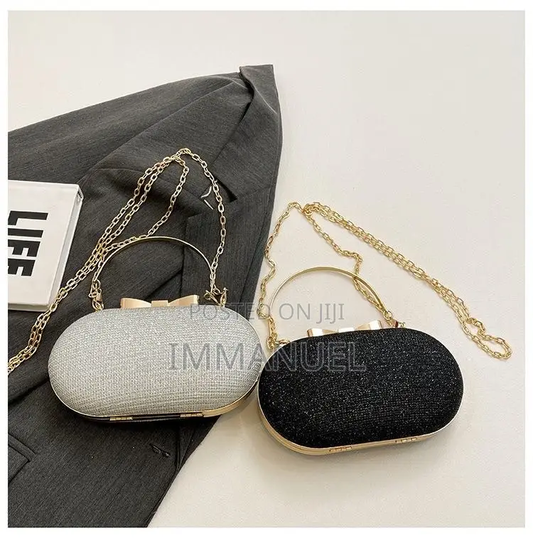 Ladies Cute Oval Clutch Bags