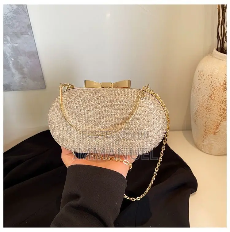 Ladies Cute Oval Clutch Bags