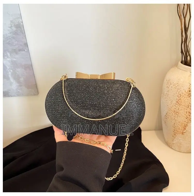 Ladies Cute Oval Clutch Bags