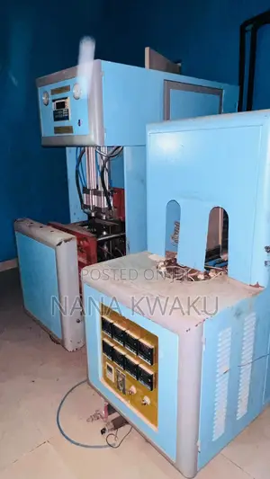Bottle Blowing Machine With Chiller Twin Cavity