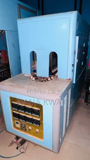 Bottle Blowing Machine With Chiller Twin Cavity