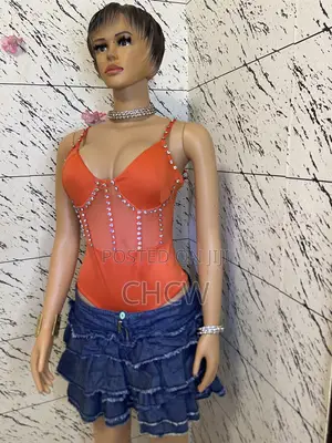 Stunning Orange Rhinestone Corset Bodysuit and a Matching Mini Skirt