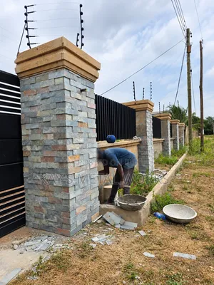 Stone Wall Cladding | Stone Laying | Fence Pillar Designs