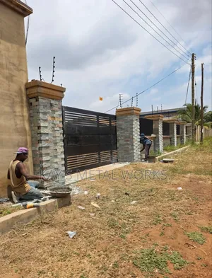 Stone Wall Cladding | Stone Laying | Fence Pillar Designs