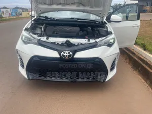 Toyota Corolla LE (1.8L 4cyl 2A) 2019 White