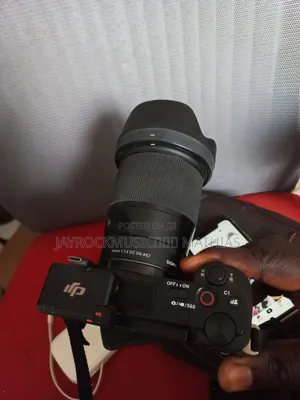 Sony Zv-E10 Camera With Sigma 16.4mm Lens.