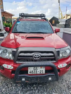 Toyota Tacoma 4dr Access Cab 4WD 6.1 ft. SB (2.7L 4cyl 4A) 2015 Red