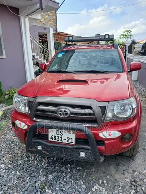 Toyota Tacoma 4dr Access Cab 4WD 6.1 ft. SB (2.7L 4cyl 4A) 2015 Red