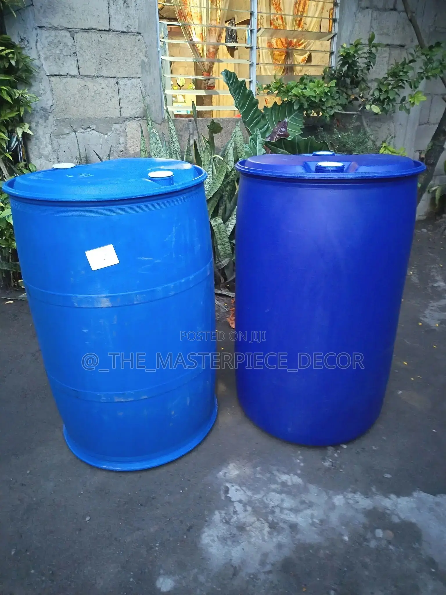 Slightly Used Blue Barrel Container (Drum) for Water Storage At